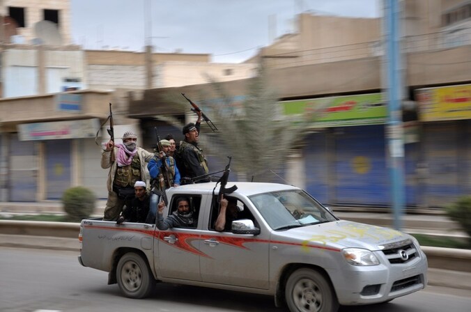 Rebellen in Raqqa, eergisteren.