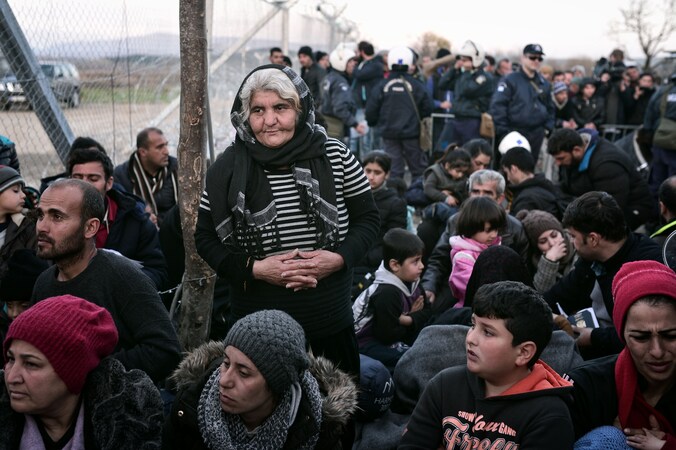 Migranten en vluchtelingen aan de Grieks-Macedonische grens.