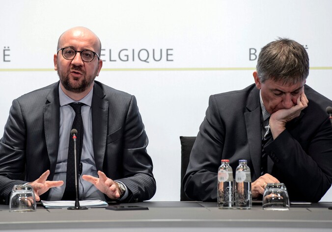 Een aangeslagen minister van Binnenlandse Zaken. Jan Jambon vandaag bij de persconferentie vandaag na de aanslagen op Brussels Airport en in het centrum van Brussel.