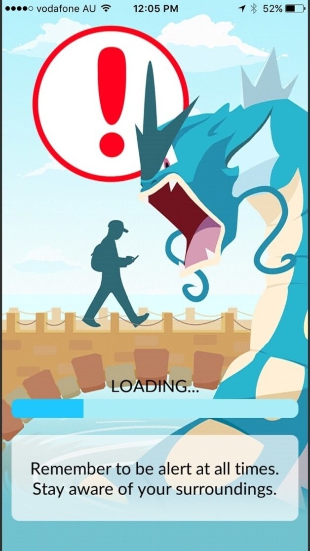 Het laadscherm van Pokémon Go waarschuwt spelers dat ze alert moeten blijven.