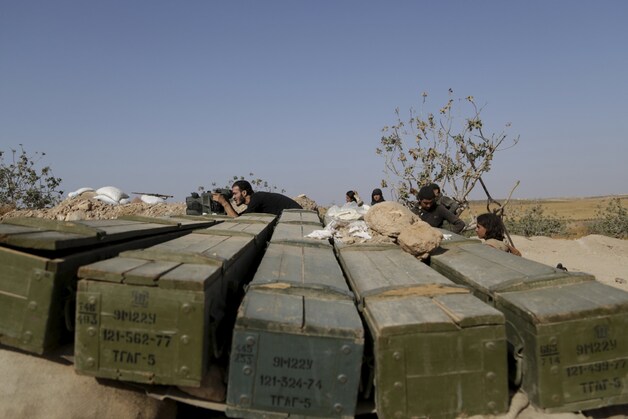 Het Vrije Syrische Leger in actie in Morek, in de provincie Hama.