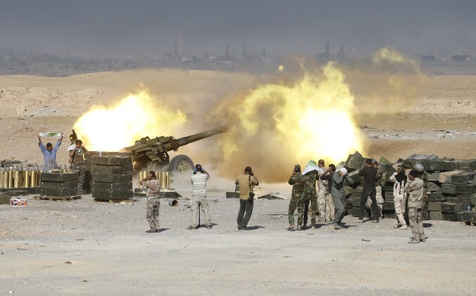 Archiefbeeld van sjiitische strijders in gevecht met IS in Irak.