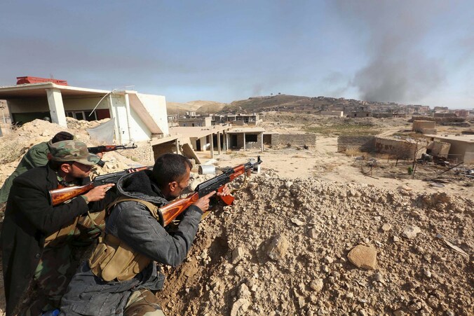 Leden van de peshmerga bij Sinjar, Irak.
