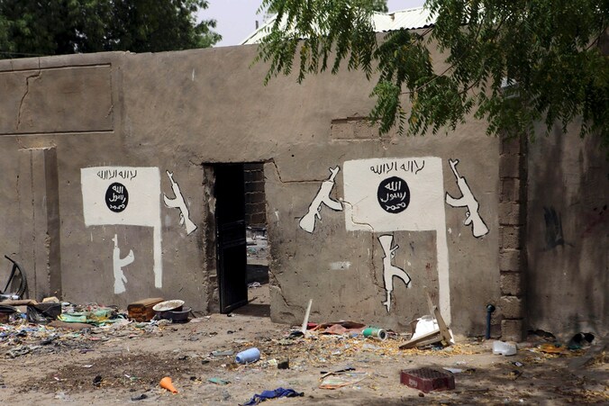 Een muur in Niger, met graffiti van Boko Haram.