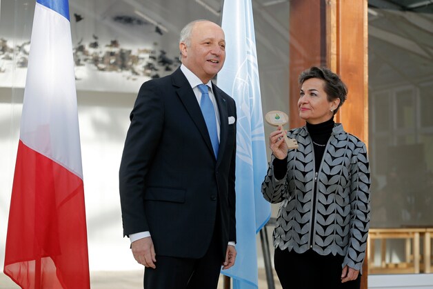 De Franse minister van Buitenlandse Zaken Laurent Fabius en klimaatverantwoordelijke van de VN Christiana Figueres.