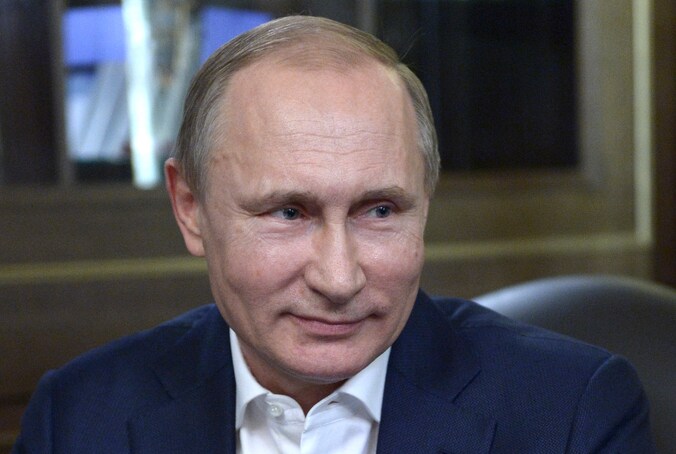 Putin tijdens zijn interview met de hoofdredacteur van het Duitse boulevardblad Bild.