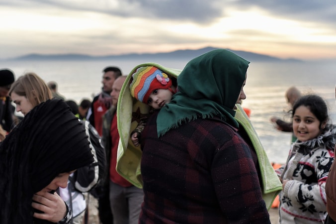 Vluchtelingen komen aan op Lesbos.