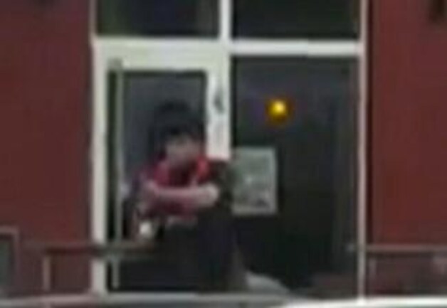 De schutter aan de McDonald's.