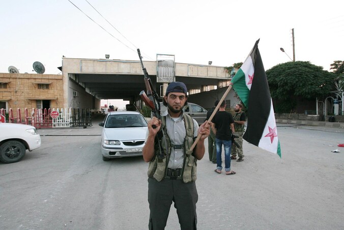Archieffoto: een Syrische rebel in Bab al-Salam.