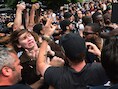 Confrontatie tussen voor- en tegenstanders van Trump tijdens een campagnebijeenkomst van Donald Trump in San Diego op 27 mei 2016.