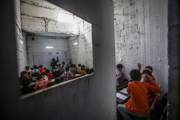 Een school in de buurt van Damascus die door de aanhoudende bombardementen naar de kelder is verhuisd.