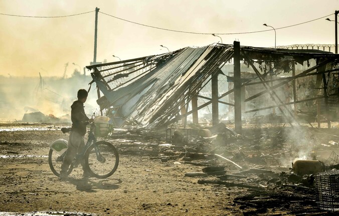 De ontmanteling van het vluchtelingenkamp in Calais