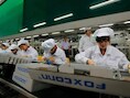 Werknemers van Foxconn in het Chinese Shenzhen.