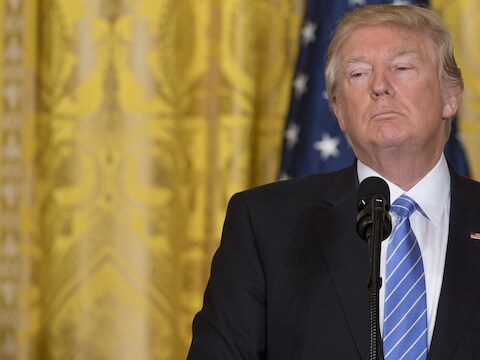 Het economische beleid dat president Trump uitstippelde, zal volgens Alan Greenspan voor een oververhitting van de grootste economie ter wereld zorgen.