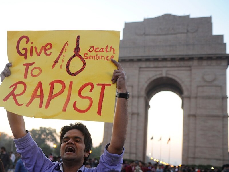 Protest bij de India Gate in de nasleping van de dodelijke groepsverkrachting in New Delhi in december.