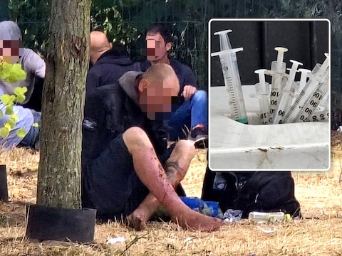 Mensen met een verslavingsproblematiek verzamelen zich in Park Spoor Oost bij de bomen om te chillen en middelen te gebruiken. Inzet: een naaldcontainer voor risicohoudend injectiemateriaal die overvol zit, waardoor spuiten eruit steken.