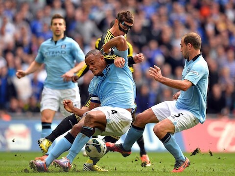 Kompany in een fel duel met de ingevallen Torres.