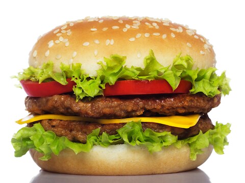 Dat we minder onze tanden in de Big Mac zetten, joeg Thompson vroeger dan verwacht richting exit.