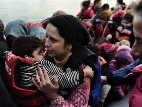 Vluchtelingen komen uit Turkije aan op het Griekse eiland Lesbos.