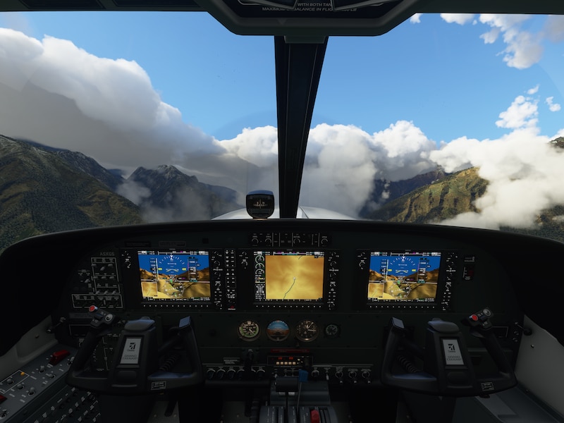 Zicht vanuit een van de realistisch weergegeven cockpits in Flight Simulator.