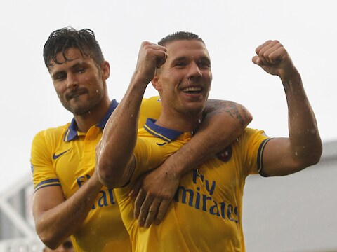 Podolski (rechts) scoorde twee keer, Giroud (links) één keer.