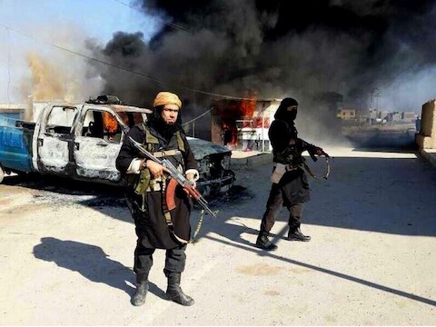 IS-strijders in Irak. De Amerikaanse special forces soldaat kwam om tijdens een reddingsoperatie van Koerdische gegijzelden.