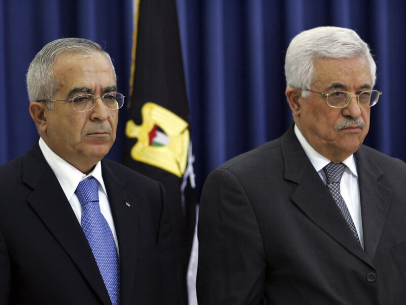 Salam Fayyad (links) naast Mahmoud Abbas.