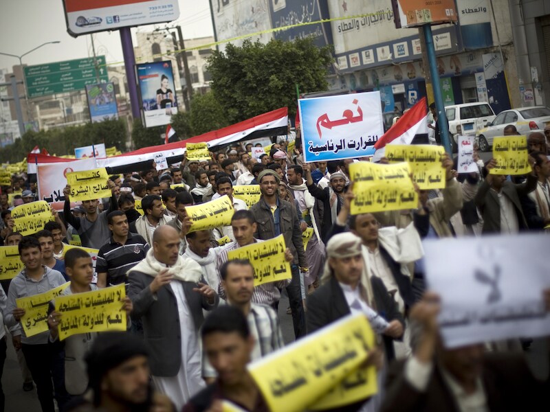 Demonstranten protesteren tegen de Houthi-rebellen, die de controle over Sanaa verwierven.