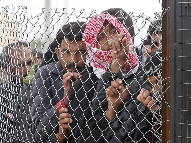Syrische vluchtelingen in een kamp in de Jordaanse stad Mafraq.
