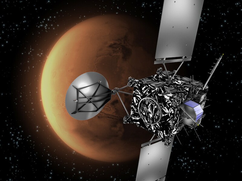 Een door ESA verspreide impressie van Rosetta, met op de achtergrond de planeet Mars.