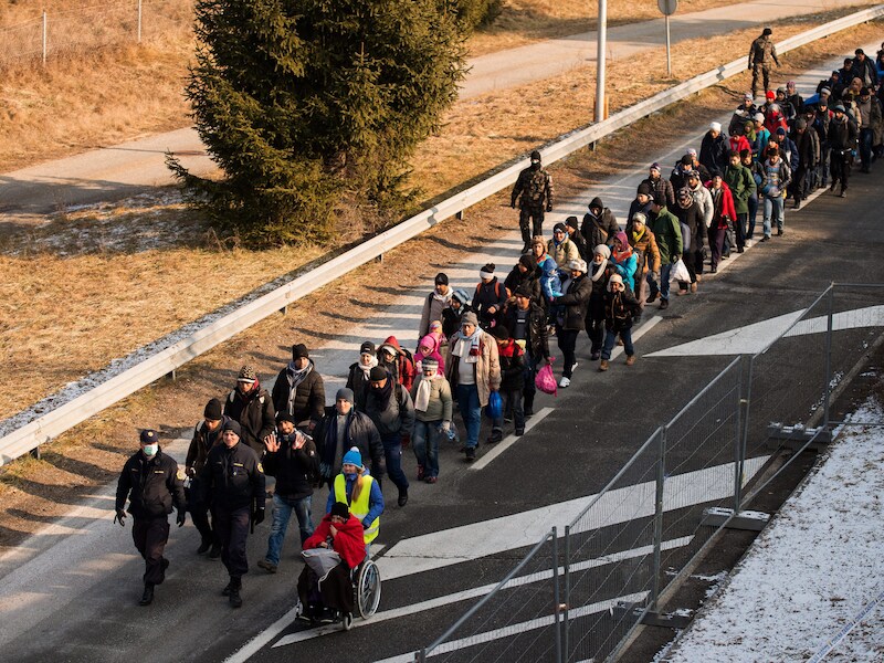 Vluchtelingen aan de grens tussen Oostenrijk en Slovenië.